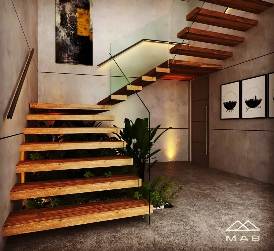 Escalera y luz natural del proyecto Candelas